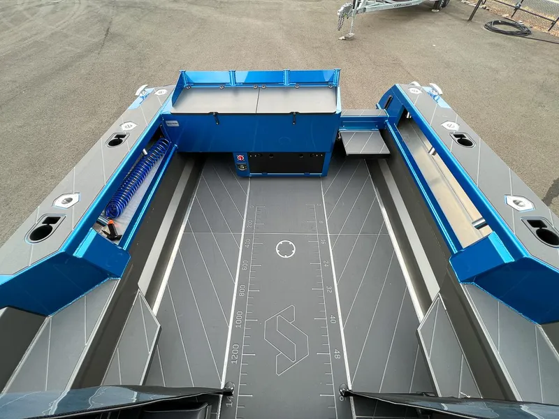 Slide: The Image of Stabicraft 2250 Ultra Centercab 2025 model, spacious deck with storage compartments and fishing rod holders. - 15