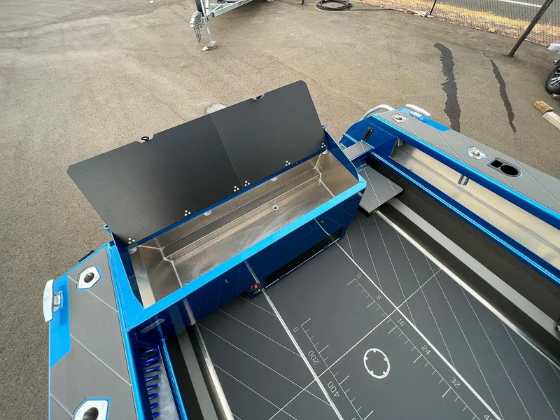 Slide: The Image of 2025 Stabicraft 2250 Ultra Centercab boat deck with open storage compartment. - 18