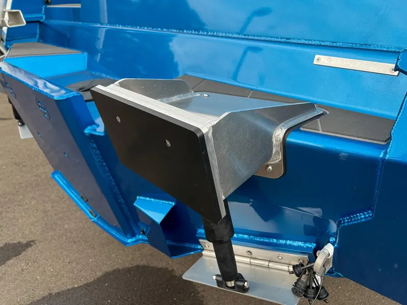 Slide: The Image of Close-up of the 2025 Stabicraft 2250 Ultra Centercab's blue hull and transom. - 26