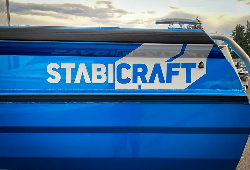 Slide: The Image of Close-up of 2025 Stabicraft 2250 Ultra Centercab boat in blue. - 27