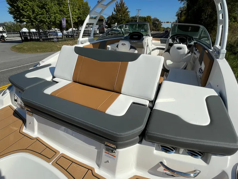 Slide: The Image of 2024 Chaparral 23 SSi OB boat with luxurious seating and modern design. - 45