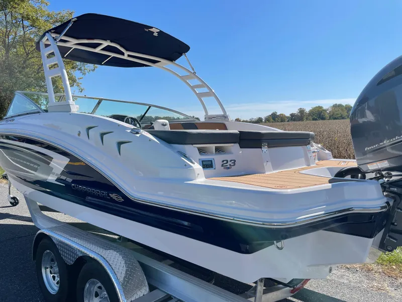 Slide: The Image of 2024 Chaparral 23 SSi OB boat on trailer with outboard motor. - 48