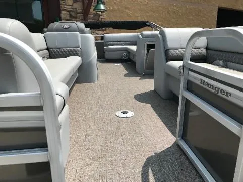 Slide: The Image of 2023 Ranger Reata 220C pontoon boat interior with spacious seating. - 7