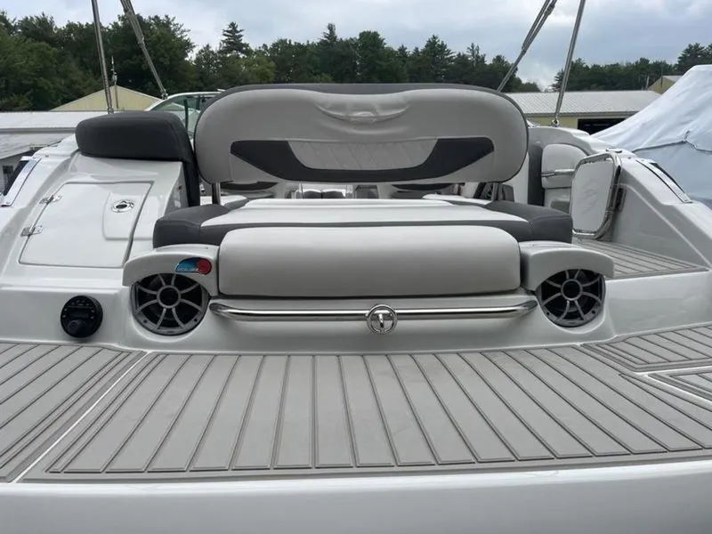 Slide: The Image of 2024 Crownline SS 260 boat rear deck with seating and speakers. - 3