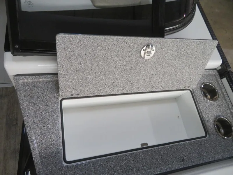 Slide: The Image of 2023 Crest Continental 270 NX SLS Twin boat storage compartment with granite countertop. - 10