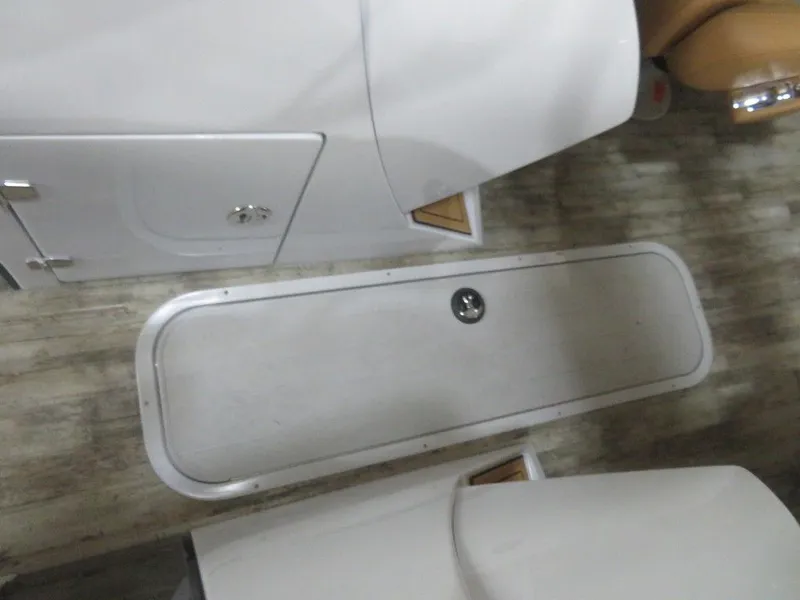 Slide: The Image of 2023 Crest Continental 270 NX SLS Twin boat interior storage compartment. - 15