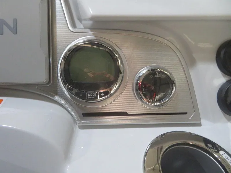 Slide: The Image of 2023 Crest Continental 270 NX SLS Twin dashboard with digital and analog gauges. - 21