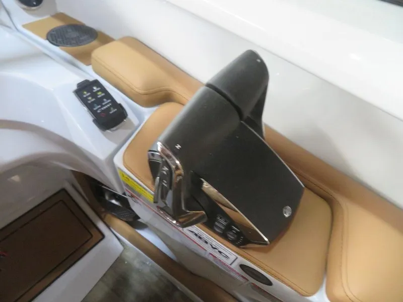 Slide: The Image of 2023 Crest Continental 270 NX SLS Twin boat throttle control and dashboard. - 24