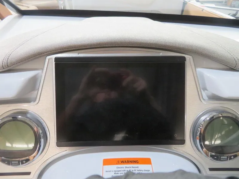 Slide: The Image of Dashboard of 2023 Crest Continental 270 NX SLS Twin boat with touchscreen display. - 27