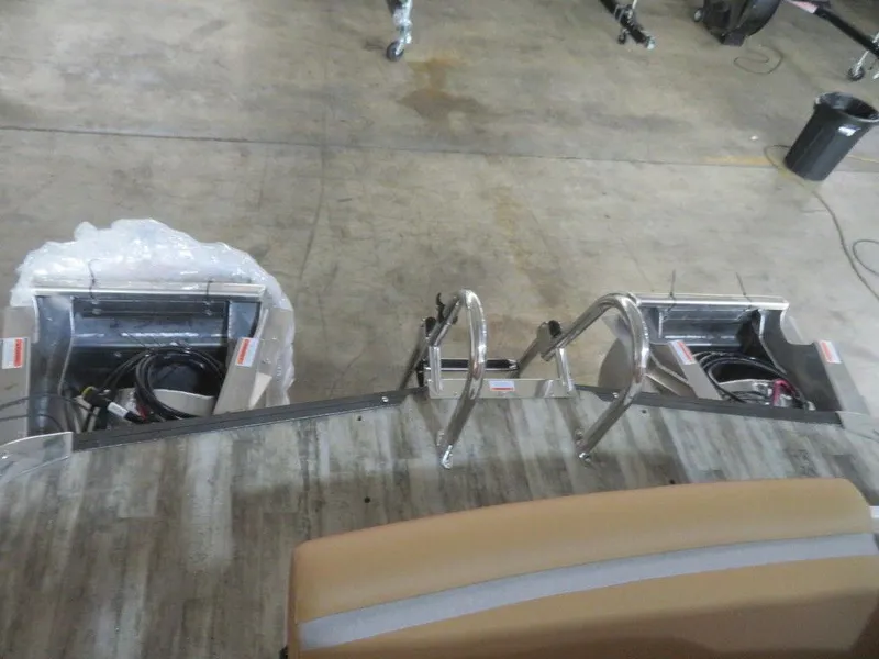 Slide: The Image of 2023 Crest Continental 270 NX SLS Twin boat interior, showing rear deck and engine compartments. - 30