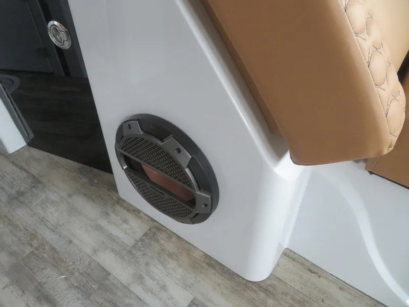 Slide: The Image of 2023 Crest Continental 270 NX SLS Twin boat interior speaker and seating detail. - 9