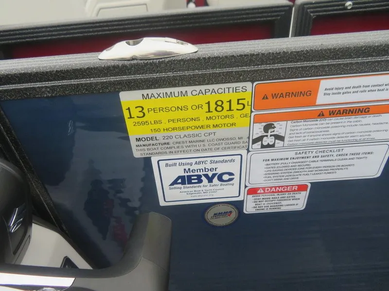 Slide: The Image of 2023 Crest Classic LX 220 L CPT DLX capacity and safety labels. - 10