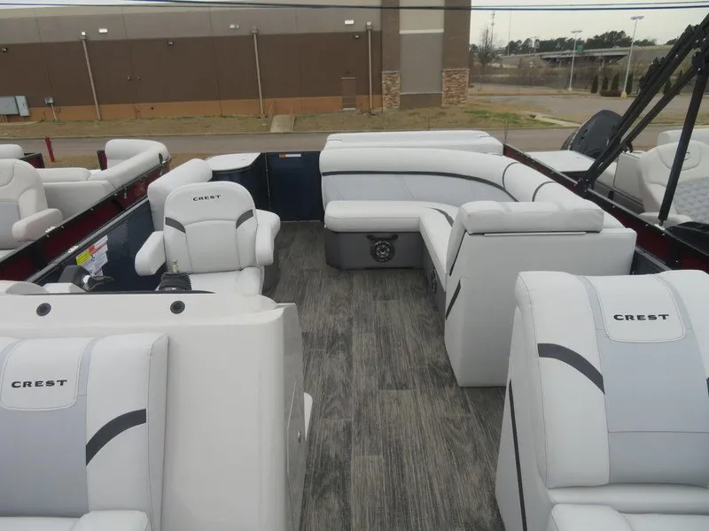 Slide: The Image of 2023 Crest Classic LX 220 L CPT DLX pontoon boat with luxurious seating and modern design. - 3