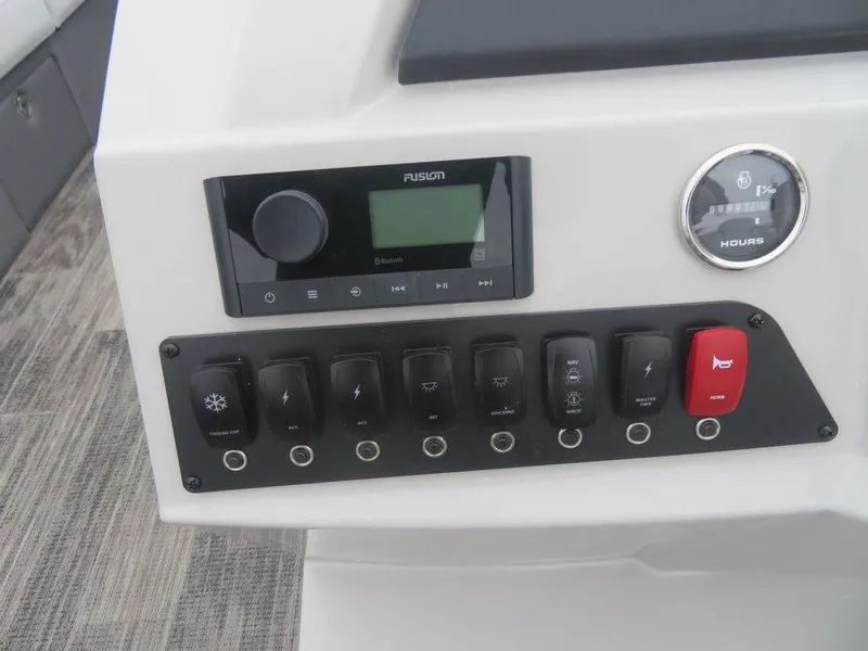 Slide: The Image of Control panel of 2023 Crest Classic LX 220 L CPT DLX pontoon boat. - 8