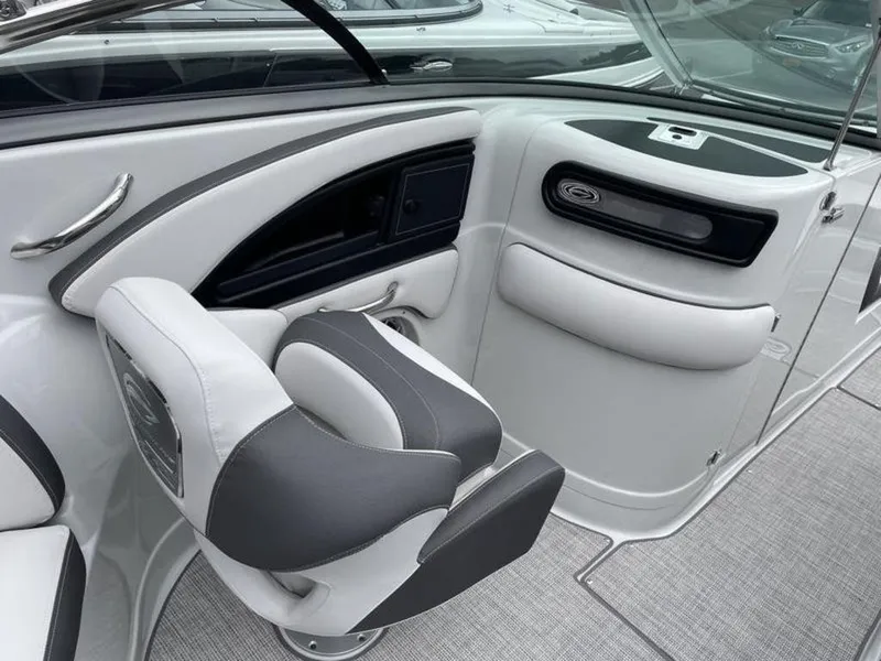 Slide: The Image of 2024 Crownline Eclipse E 255 boat interior with gray and white seating. - 4