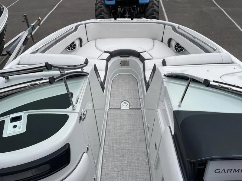 Slide: The Image of 2024 Crownline Eclipse E 255 boat interior with spacious seating and modern design. - 8