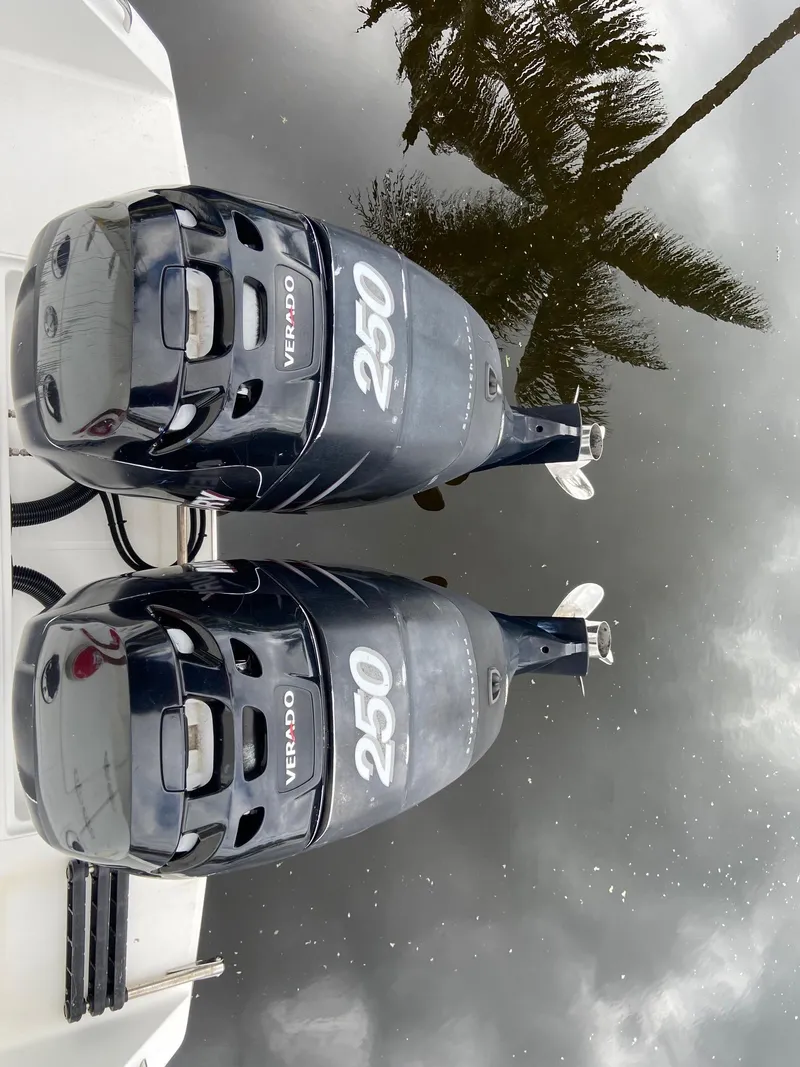 Slide: The Image of Twin 250 Verado engines on a 2000 Stamas 290 Tarpon boat. - 30