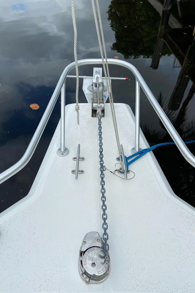Slide: The Image of Bow of a 2000 Stamas 290 Tarpon boat with anchor chain and windlass. - 8