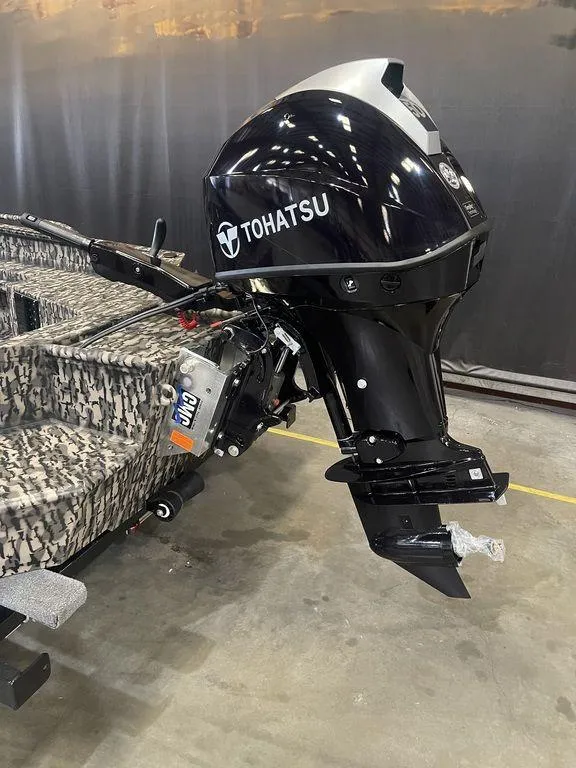 Slide: The Image of 2023 Legend Craft Outlaw 1656 boat with Tohatsu outboard motor. - 13