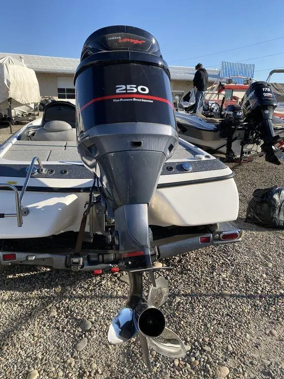 Slide: The Image of 2006 Skeeter Bass Boat with 250 horsepower outboard motor, rear view. - 2