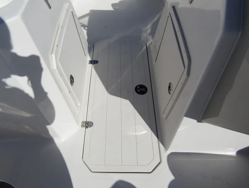 Slide: The Image of 2023 Starcraft SVX 210 OB boat storage compartments. - 16