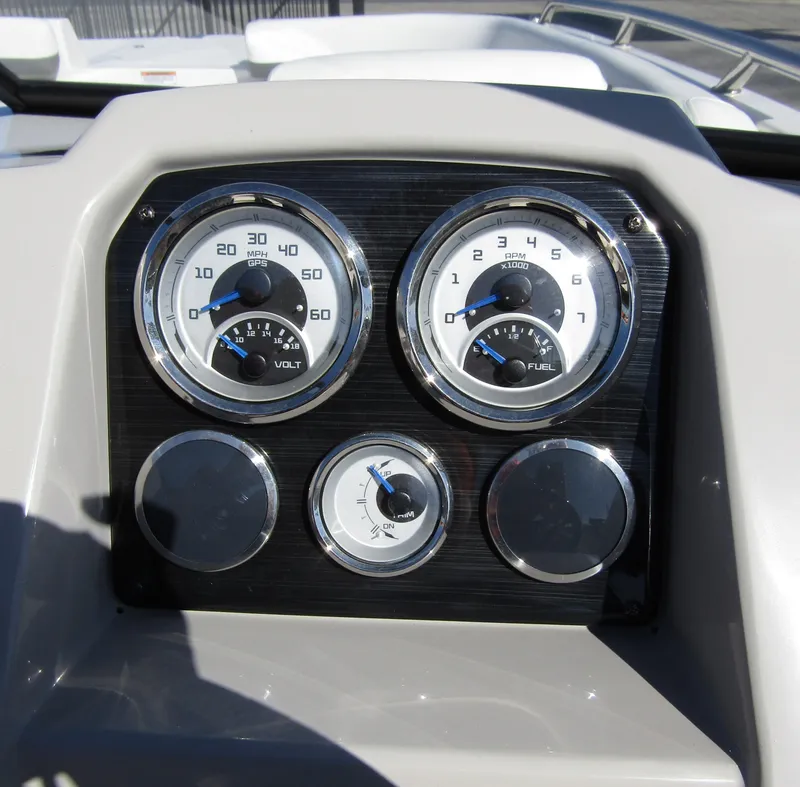 Slide: The Image of Dashboard gauges of 2023 Starcraft SVX 210 OB boat, showing speed, fuel, and voltage levels. - 22