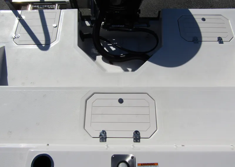 Slide: The Image of 2023 Starcraft SVX 210 OB boat deck with storage compartments. - 28