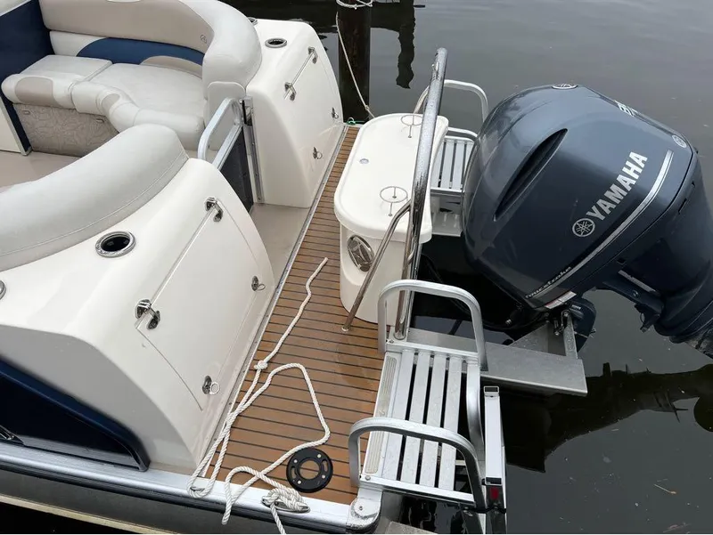 Slide: The Image of 2013 Avalon AMBASSADOR 2785 ENTERTAINER boat with Yamaha outboard motor. - 11