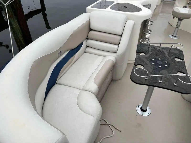 Slide: The Image of Luxurious seating area on a 2013 Avalon AMBASSADOR 2785 ENTERTAINER boat. - 21