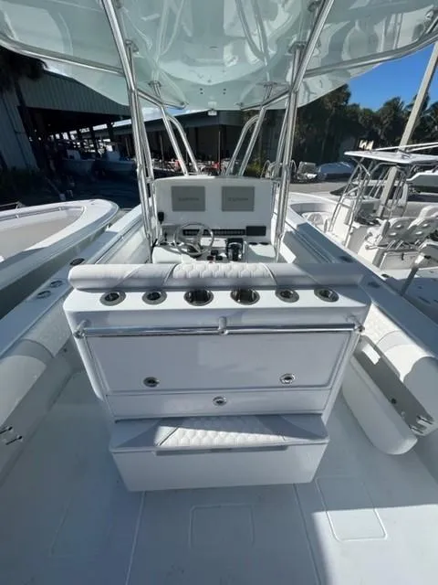 Slide: The Image of 2025 Contender 35 ST boat interior with modern console and seating. - 17