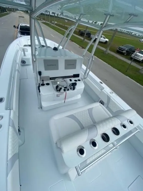Slide: The Image of 2025 Contender 35 ST boat interior with modern helm and seating. - 6