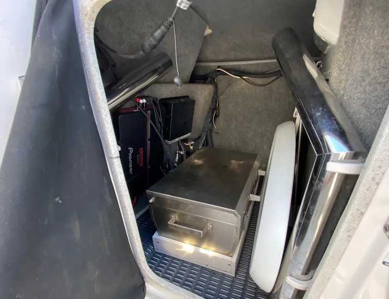 Slide: The Image of Storage compartment of a 2016 Chaparral 224 Sunesta boat with equipment and accessories. - 16