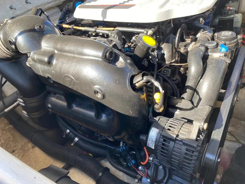 Slide: The Image of Engine compartment of a 2016 Chaparral 224 Sunesta boat. - 31