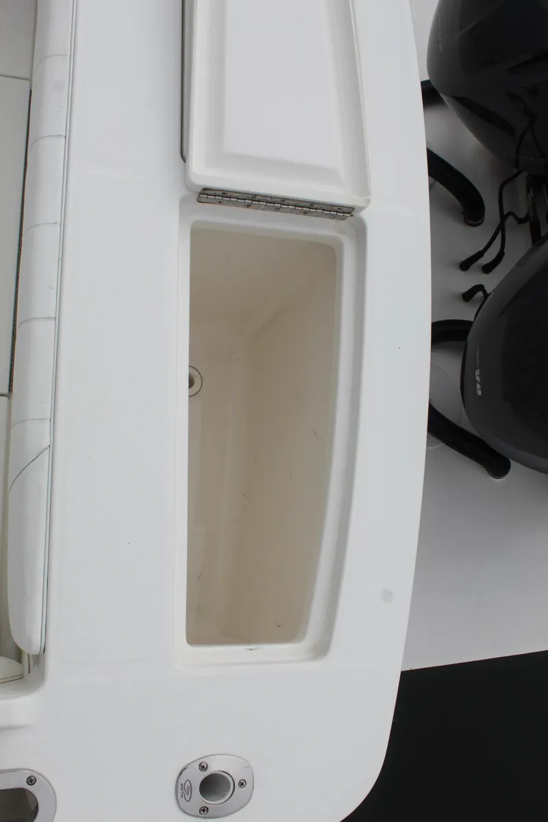 Slide: The Image of 2014 Regulator 34 SS boat storage compartment and engine view. - 39