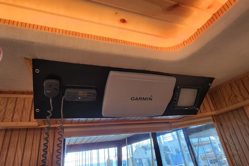 Slide: The Image of Sunstar 16x78 houseboat interior with Garmin navigation system, 1996 model. - 19