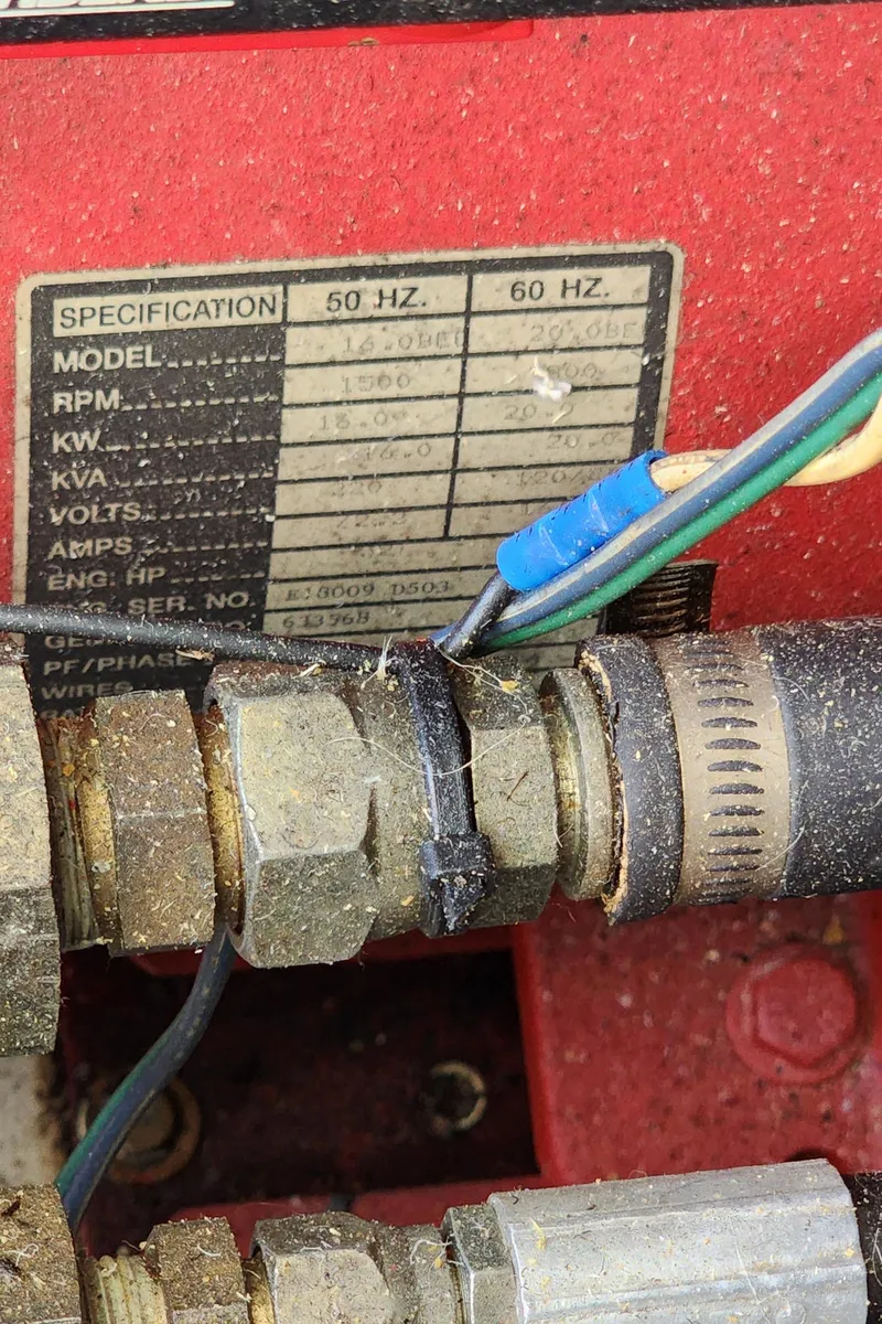 Slide: The Image of Close-up of a 1996 Sunstar 16x78 engine component with wiring and specifications. - 23