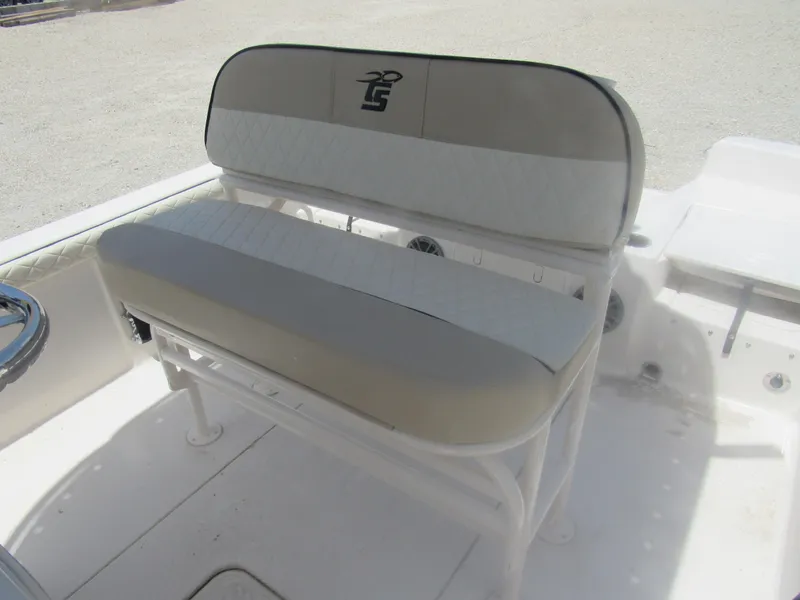 Slide: The Image of 2022 Carolina Skiff 21 LS boat seat with white and beige upholstery. - 21