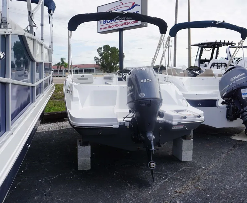 Slide: The Image of 2023 Hurricane 185 SS boat with Yamaha 115 outboard motor on display. - 10