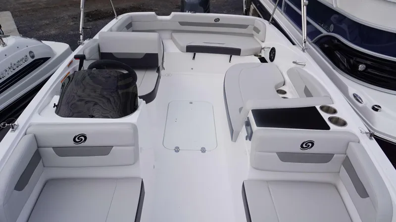 Slide: The Image of 2023 Hurricane 185 SS boat interior with seating and steering console. - 13