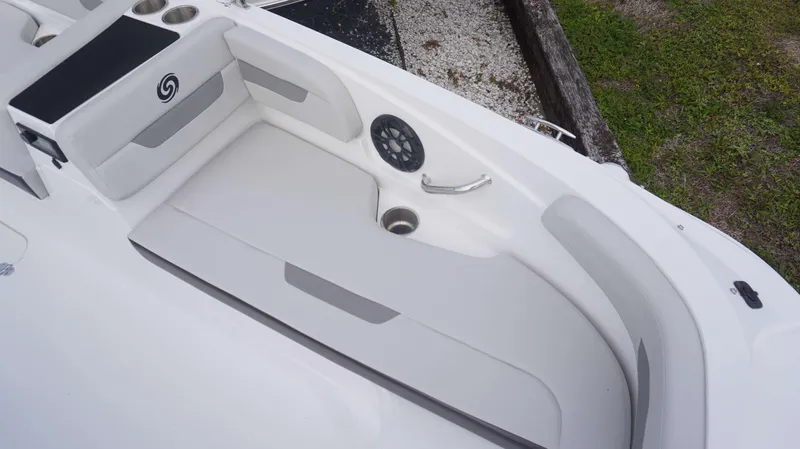 Slide: The Image of 2023 Hurricane 185 SS boat interior with cushioned seating and cup holders. - 14