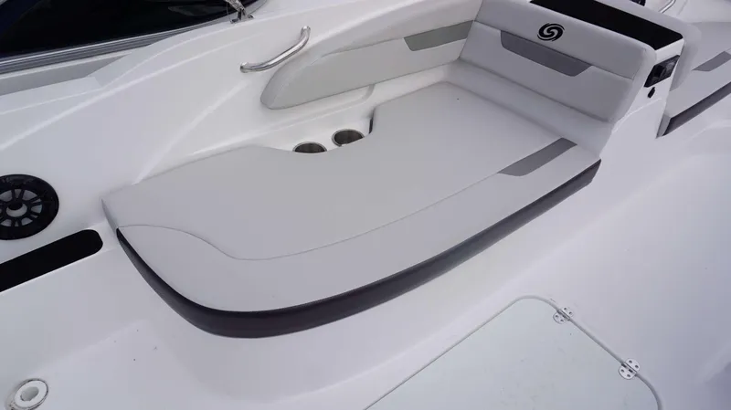 Slide: The Image of 2023 Hurricane 185 SS boat interior with cushioned seating and cup holders. - 4