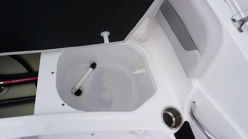 Slide: The Image of 2023 Hurricane 185 SS boat interior storage compartment and seating area. - 8