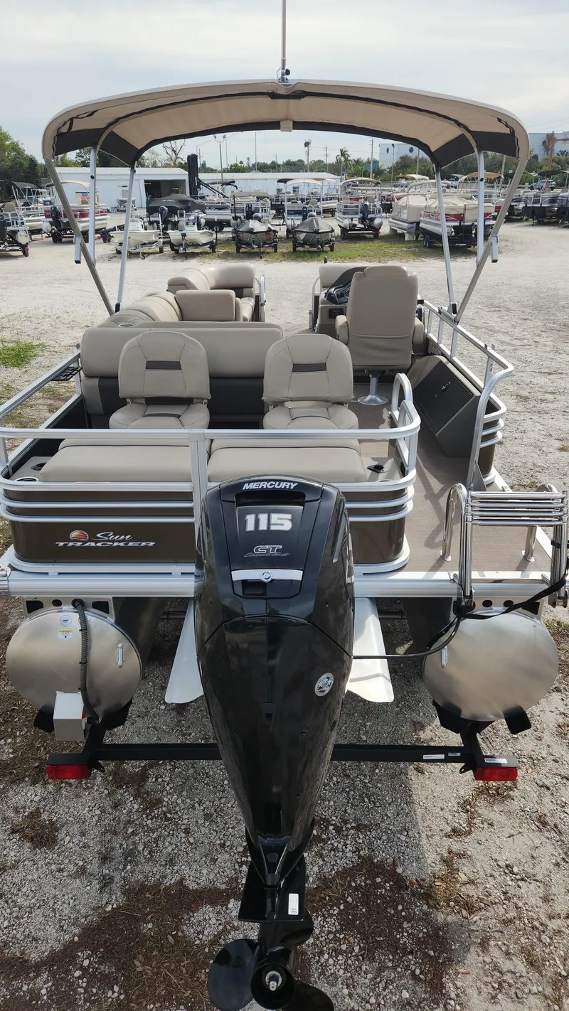 Slide: The Image of 2023 Sun Tracker SportFish 22 DLX pontoon boat with Mercury 115 outboard motor. - 3