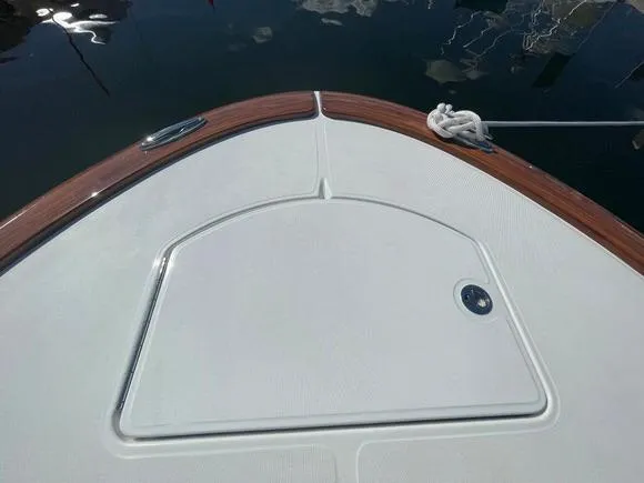 Slide: The Image of 2025 Mag Bay 43 Center Console boat bow with anchor hatch. - 36