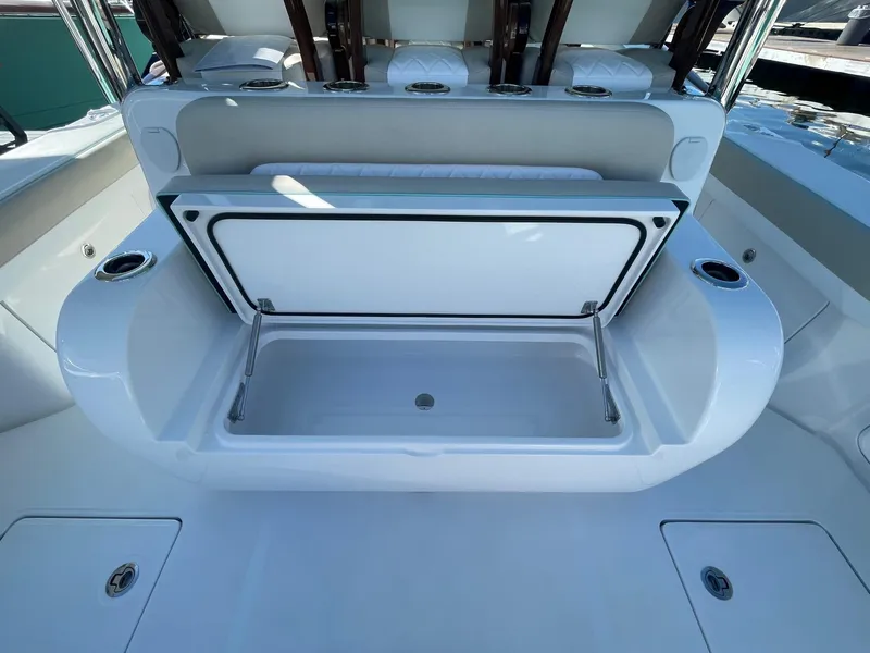 Slide: The Image of 2025 Mag Bay 43 Center Console boat with open storage compartment. - 18