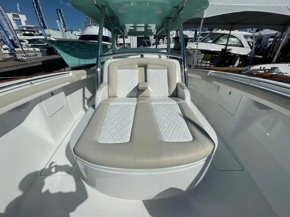 Slide: The Image of 2025 Mag Bay 43 Center Console boat with luxurious seating and modern design. - 44