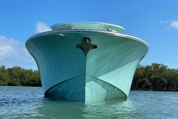 Slide: The Image of 2025 Mag Bay 43 Center Console boat on calm water. - 6