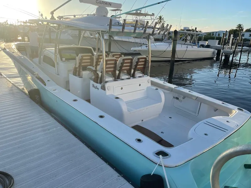 Slide: The Image of 2025 Mag Bay 43 Center Console boat docked at marina. - 14