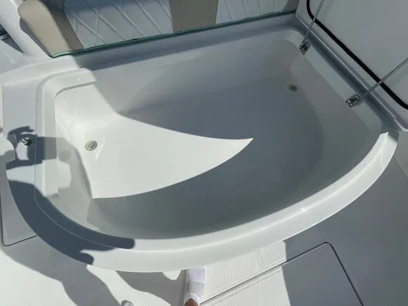 Slide: The Image of 2025 Mag Bay 43 Center Console boat's spacious white bathtub. - 46