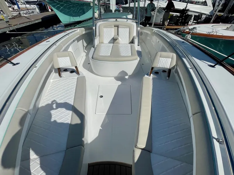 Slide: The Image of 2025 Mag Bay 43 Center Console boat with spacious seating and modern design. - 25